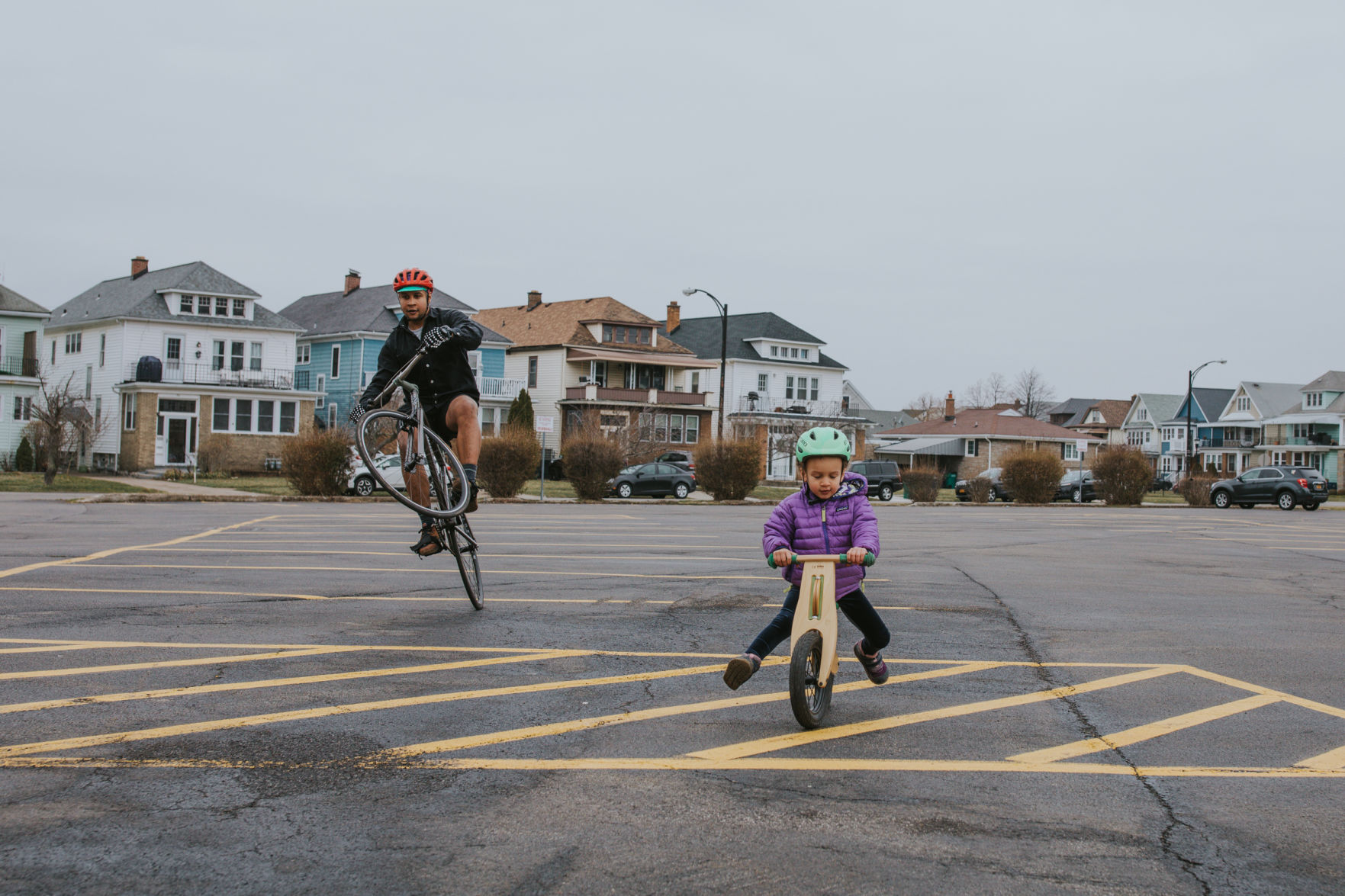 Getting some energy out in the empty school parking lot.